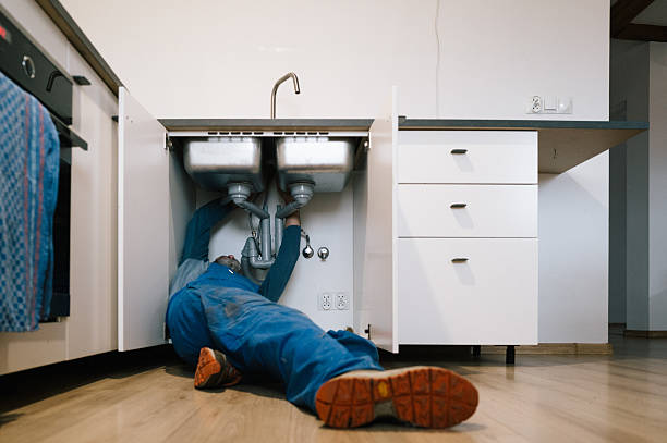 Professional Emergency Plumber technician working in Elmsford, NY